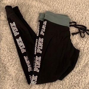 Black leggings with pink logo